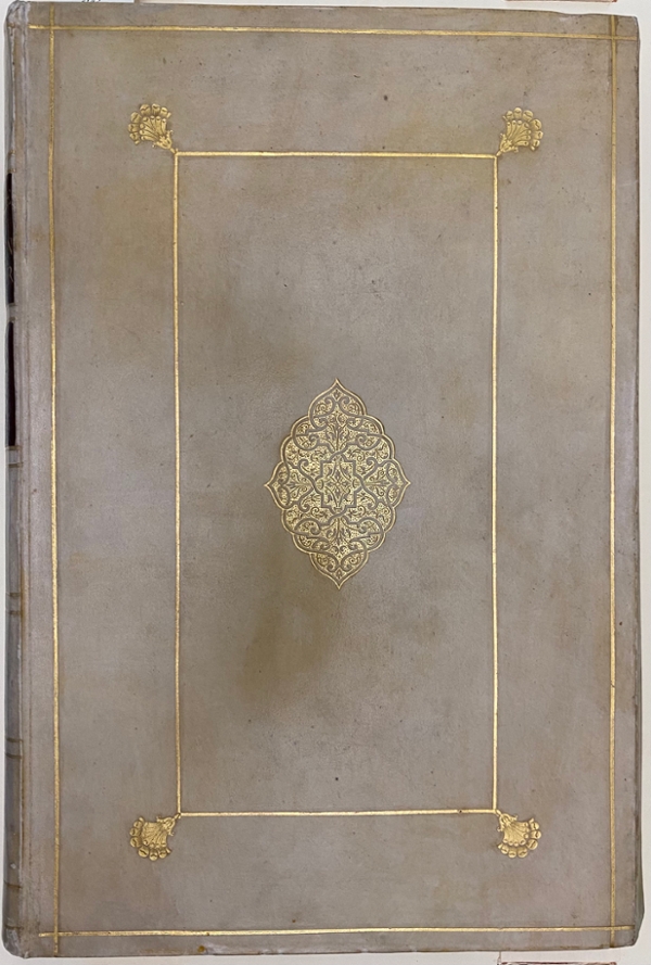 Cover of the 1662 Book of Common Prayer (BCP) facsimile. The image shows the cover of the book, in white tarnished leather, with a  golden geometrical design. The book is held at the Cushing Memorial Library and Archives.